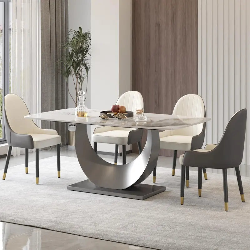 Tavolo da pranzo moderno con piano curvo in pietra sinterizzata e base a forma di luna