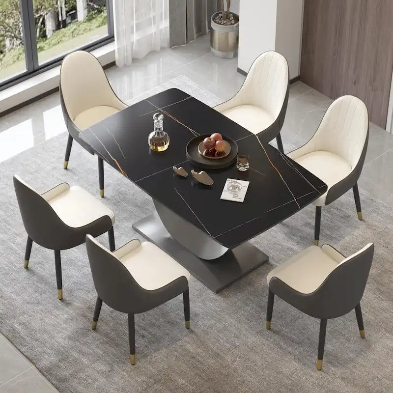 Tavolo da pranzo moderno con piano curvo in pietra sinterizzata e base a forma di luna