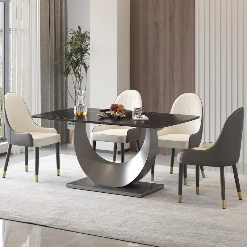 Tavolo da pranzo moderno con piano curvo in pietra sinterizzata e base a forma di luna