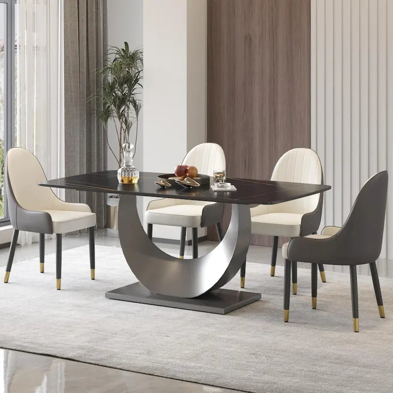 Tavolo da pranzo moderno con piano curvo in pietra sinterizzata e base a forma di luna