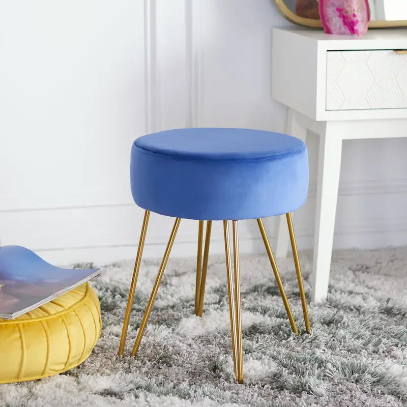 Pouf rotondo con gambe a forcina