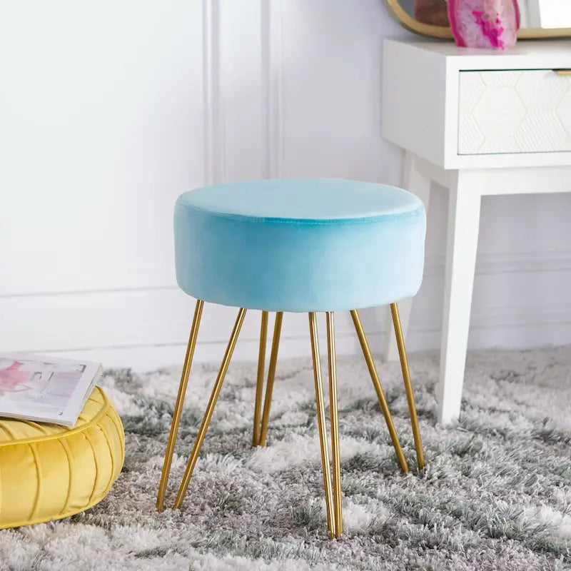 Pouf rotondo con gambe a forcina
