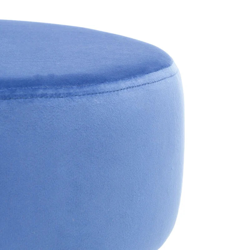 Pouf rotondo con gambe a forcina